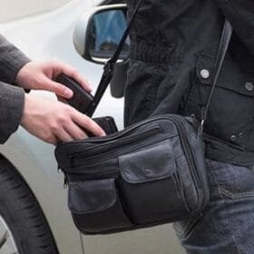 a person holding a bag