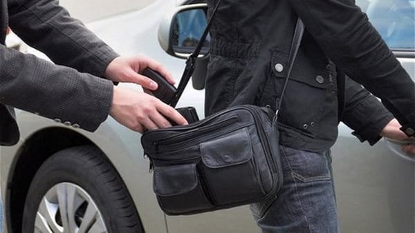 a person holding a bag